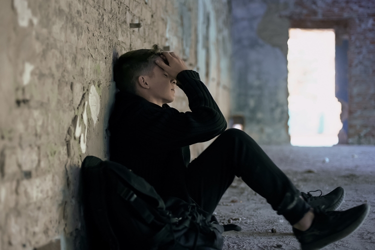 Depressed teenage boy - county lines exploitation