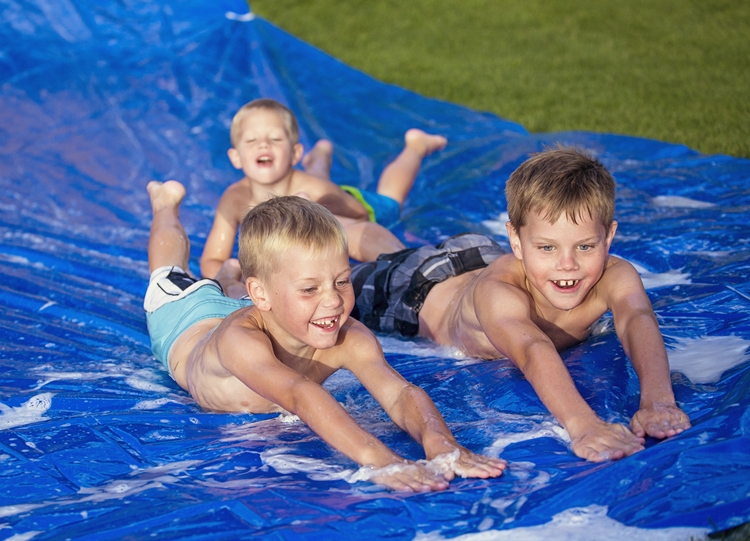 boys on slip n slide - fun summer activities
